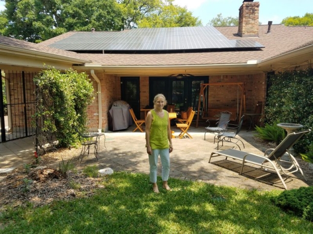 Dori Wolfe, one of the exhibitors in the Industry Showcase, leads CEBN staff on a tour of net zero home energy solutions the day after the forum.
